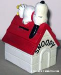 Snoopy holding Woodstock bank