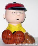 Charlie Brown sitting with baseball mitt Bank