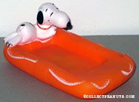 Snoopy laying on orange raft Soap Dish