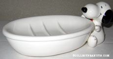 Snoopy sits by Soap Dish