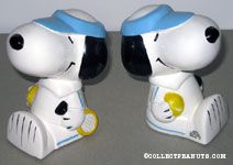 Snoopy sitting in with Tennis Racket and Ball Bookends