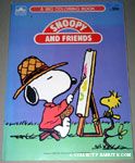Snoopy painting at easel with Woodstock Coloring Book