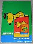Snoopy peering over edge of book '1981' Snoopy Day by Day Calendar