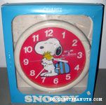 Snoopy hugging Woodstock with luggage Wall Clock