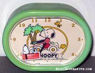 Snoopy driving VW Beetle with Woodstock and palm trees Alarm Clock