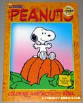 Snoopy sitting on top of Pumpkin Coloring Book