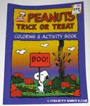 Snoopy holding 'Boo!' Sign in pumpkin patch Coloring Book