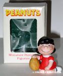 Lucy with Football Figurine