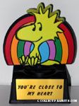 Woodstock in front of rainbow 'You're Close to my Heart' Trophy