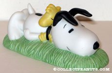 Snoopy & Woodstock laying on grass Figurine