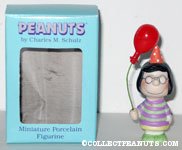 Marcie holding balloon Figurine