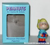 Sally holding present Figurine