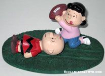 Lucy pulling football