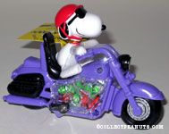 Joe Cool riding purple motorcycle 60th Anniversary Candy Container