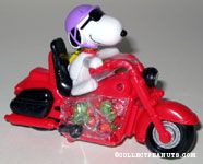 Joe Cool riding red motorcycle 60th Anniversary Candy Container