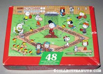 Peanuts playing Baseball