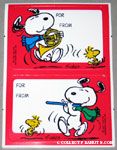 Snoopy playing horn and flute with Woodstock gift tags