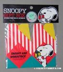 Snoopy holding gift