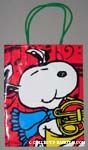 Snoopy playing horn