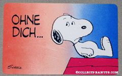 Snoopy laying on doghouse 'Ohne diche... sieht die welt so leer aus.' Wallet Greeting Card