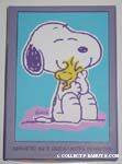 Snoopy hugging Woodstock