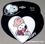 Charlie Brown hugging Snoopy Barrette