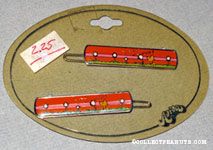 Woodstock blowing on dandelions Barrette