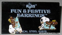 Snoopy looking in Woodstock's Nest