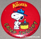 Snoopy leaning on birthday cake Knott's Berry Farm Button