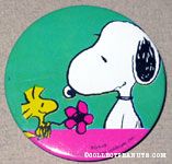 Woodstock giving Snoopy a Flower Button