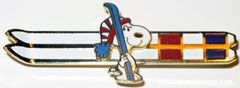 Snoopy holding skis Pin
