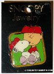Snoopy sitting in Charlie Brown's lap Pin