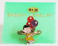 Lucy holding balloons Ring