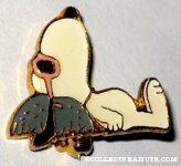 Joe Cool laying on rock Pin