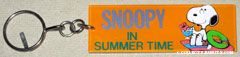 Snoopy sipping drink on Beach Towel Keychain