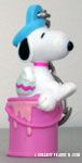 Snoopy sitting on blue paint can with egg Keychain