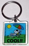 Joe Cool & Woodstock in lounge chair under sun 'Cool' Keychain