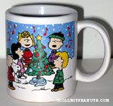 Peanuts gang singing around decorated Christmas Tree Mug