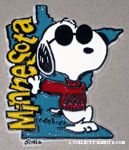 Joe Cool wearing Camp Snoopy shirt leaning on Minnesota Magnet
