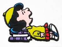  Lucy laying on pile of books Magnet