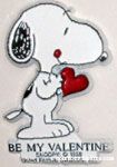 Snoopy holding Heart