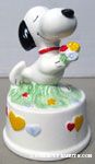 Snoopy holding flowers