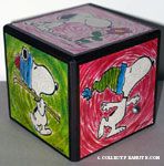 Snoopy scenes on cube Music box