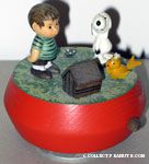 Snoopy , Woodstock and Linus standing around tiny doghouse Musicbox