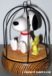 Snoopy on tree swing with Woodstock Musicbox