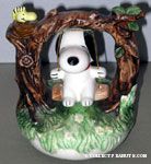 Snoopy on tree swing with Woodstock Musicbox