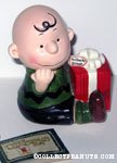 Charlie Brown holding Christmas Gift Music box