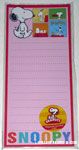 Snoopy walking next to comic panels List Pad