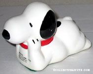 Snoopy lying on tummy