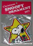 Snoopy sitting with star and presents 'Noel 1977' Wooden Ornament